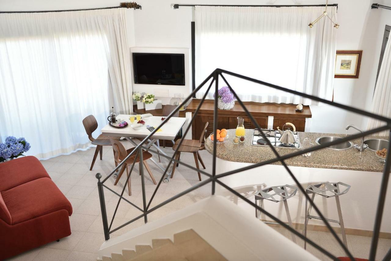 Residence L'Ea Di Lavru - Appartamenti Mono-Bilo-Trilocali ปอร์โตซานเปาโล ภายนอก รูปภาพ